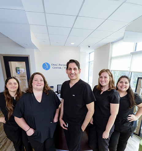 Oral surgeon and team members