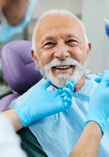 Man smiling at the dentist